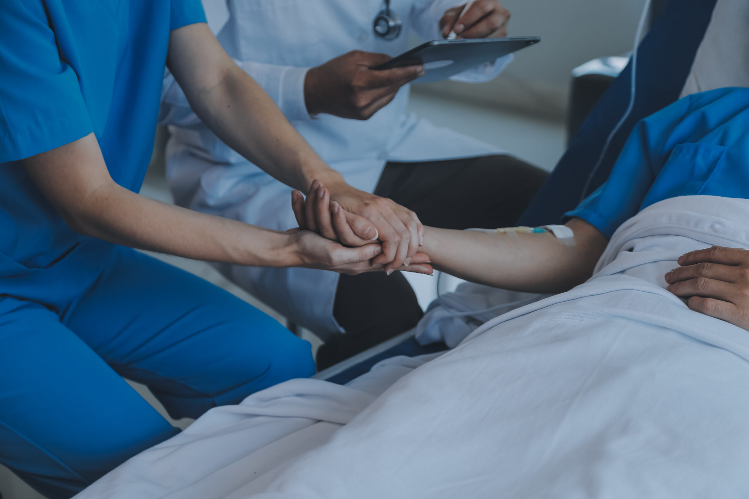 women asian doctors hold the patient hand and encourage and prov